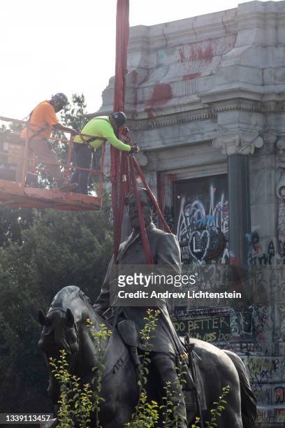 The statue of Confederate General Robert Lee is removed at Monument Avenue on September 8, 2021 in Richard, Virginia. Put up in 1890 to help...