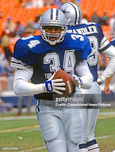 View of American football player Herschel Walker, of the Dallas Cowboys, on the field prior to a game at RFK Stadium, Washington DC, December 11,...