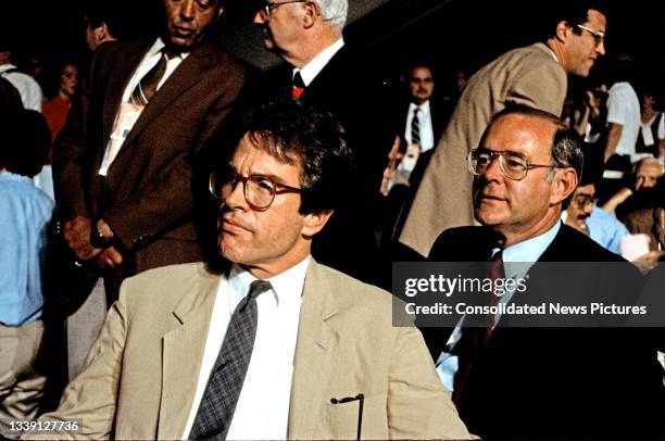 View of American actor and activist Warren Beatty and Chairman of the Democratic National Committee Charles Manatt as they watch the proceedings of...