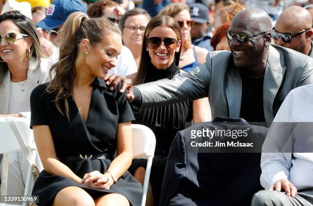 Hall of Famer Michael Jordan has a laugh with Hannah Jeter, wife of inductee Derek Jeter, during the Baseball Hall of Fame induction ceremony at...