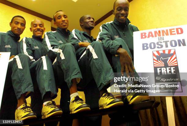 Boston Marathon Runners, Belay Teka Kassa, Tamrat Awalew, Birhanu Wukaw all from Ethiopia and Jared Nyamboki and Joseph Sitienei of Kenya all sport...