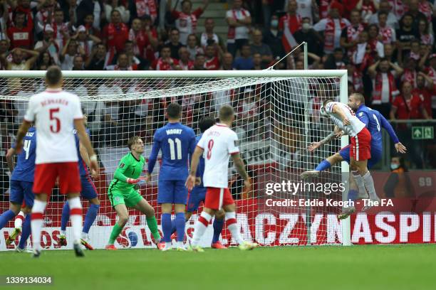 Damian Szymanski of Poland scores their team's first goal during the 2022 FIFA World Cup Qualifier match between Poland and England at Stadion...