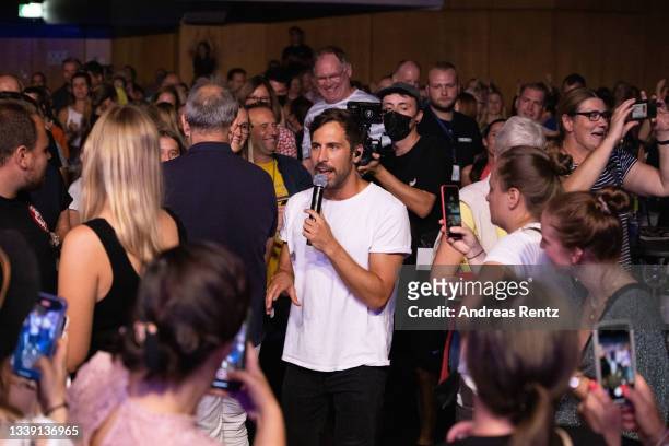 Max Giesinger performs on stage for the first time after more than 15 months of Covid-19 restrictions, indoors at Brückenforum on September 08, 2021...