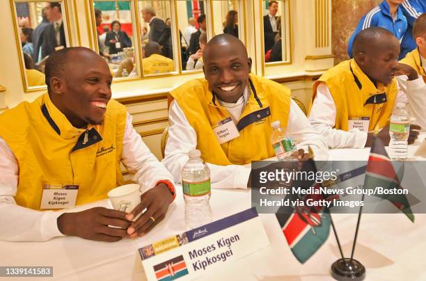 Marathon elite runners and several notable past champions meet the press at the Fairmont Copley Plaza Hotel. Kenyan runners Moses Kigen Kipkosgei and...