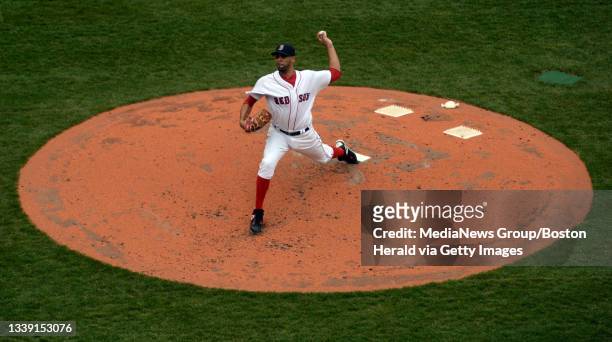 Boston Red Sox starting pitcher David Price throws against the Baltimore Orioles in the second inning of during the home opener at Fenway Park in...