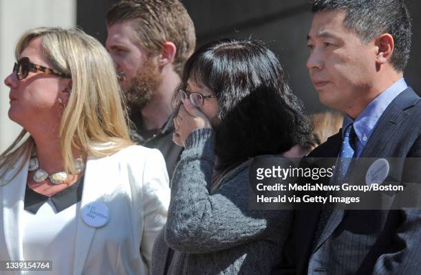 Photo shows the girlfriend of Mayor Martin Walsh Lorrie Higgins, Ling Meng and Jun Lu the parents of the late Lingzi Lu on Friday,April 15, 2016...