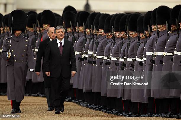 The President of Turkey Abdullah Gul inspects the Guard of Honour with Prince Philip, Duke of Edinburgh on Horse Guards Parade on November 22, 2011...