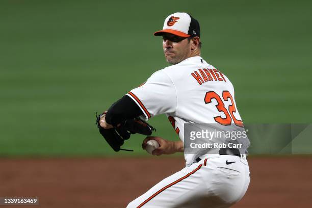 Starting pitcher Matt Harvey of the Baltimore Orioles throws to a Kansas City Royals batter in the third inning at Oriole Park at Camden Yards on...