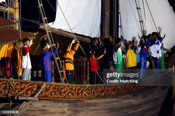 Representatives of all participating nations wave goodbye during the Closing Ceremony on day 12 of the 2011 Southeast Asian Games at Jakabaring...