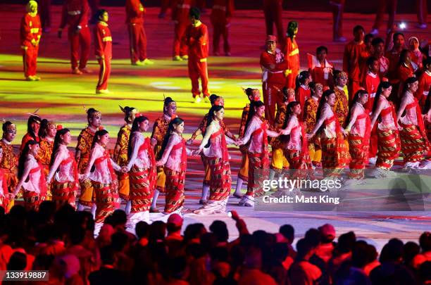 Performers from Myanmar, the host of the 2013 Southeast Asian Games, take part in the Closing Ceremony on day 12 of the 2011 Southeast Asian Games at...