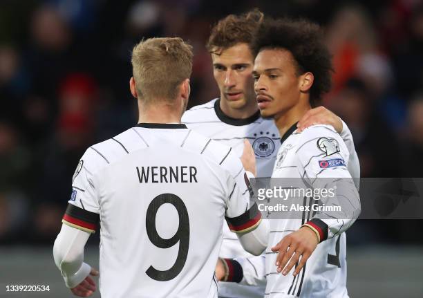Leroy Sane of Germany celebrates his team's third goal with teammates Timo Werner and Kai Havertz during the 2022 FIFA World Cup Qualifier match...