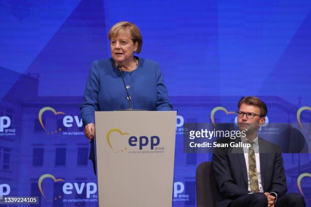 German Chancellor and former leader of the German Christian Democrats Angela Merkel speaks as Daniel Caspary, head of the German Christian Democrats...