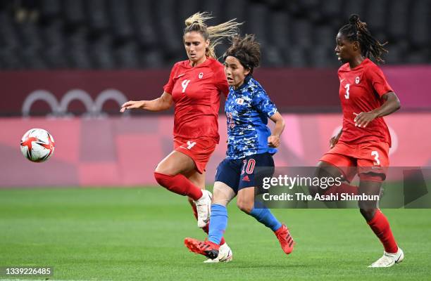 Mana Iwabuchi of Team Japan scores her side's first goal during the Women's First Round Group E match between Japan and Canada during the Tokyo 2020...