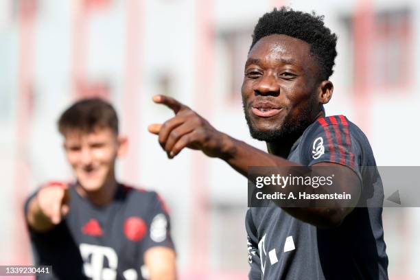 Alphonso Davies of Bayern Muenchen reacts during a training session at Saebener Strasse training ground on September 09, 2021 in Munich, Germany.