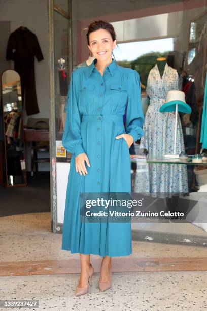 Patroness of the festival Serena Rossi attends a photocall at the "Cooperativa Il Cerchio" space during the 78th Venice International Film Festival...