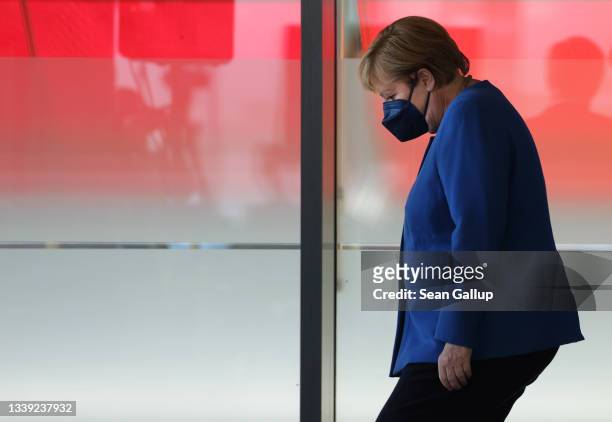 German Chancellor and former leader of the German Christian Democrats Angela Merkel departs after speaking to the media at a congress of the European...
