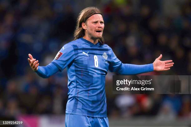 Birkir Bjarnason of Icelandreacts during the 2022 FIFA World Cup Qualifier match between Iceland and Germany at Laugardalsvollur National on...