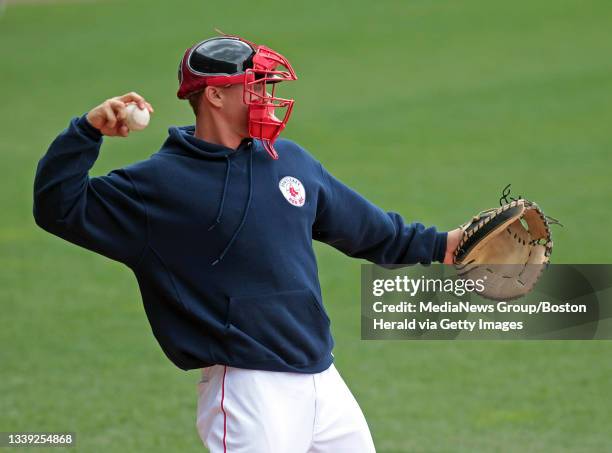 Pawtucket, RI)Pawtucket Red Sox catcher Ryan Lavarnway, who wasn't playing, warms up a relief pitcher during a game at McCoy Stadium in Pawtucket, RI...