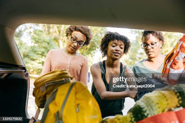 it's the summer of road trips here's how to do it right - african ethnicity car stock pictures, royalty-free photos & images