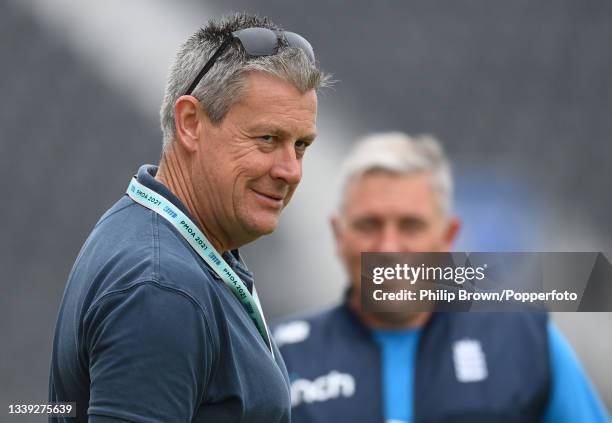 Ashley Giles and Chris Silverwood of England look on during a training session before Friday's fifth LV= Test Match between England and India at Old...