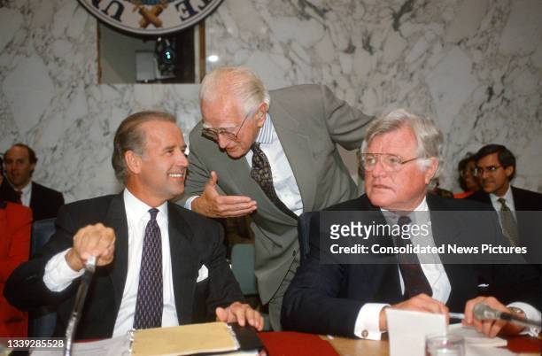 View of, from left, US Senate Committee on the Judiciary Chairman US Senator Joe Biden with fellow Senators, Howard Metzenbaum and Ted Kennedy talk...