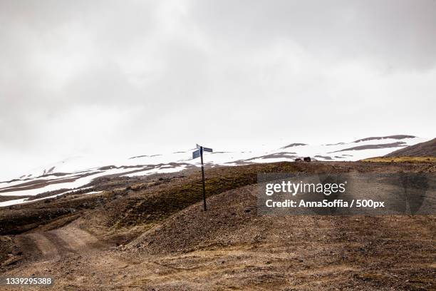 scenic view of snowcapped mountain against sky - landslag imagens e fotografias de stock