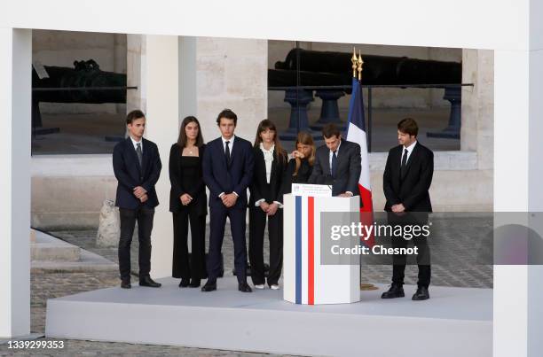 Jean-Paul Belmondo's daughter, Stella Belmondo , listens to the speech of Jean-Paul Belmondo's grand-son, French actor Victor Belmondo , flanked by...