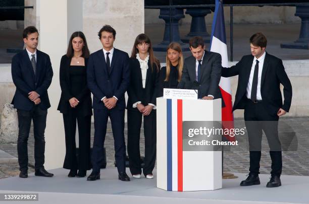 Jean-Paul Belmondo's daughter, Stella Belmondo , listens to the speech of Jean-Paul Belmondo's grand-son, French actor Victor Belmondo , flanked by...