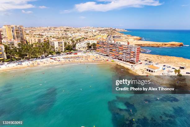 aerial view torrevieja beach and turquoise mediterranean sea at sunny summer day. spain - alicante province stock pictures, royalty-free photos & images