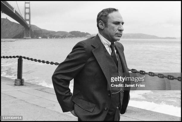 View of American film director Mel Brooks on Marine Drive, at the base of the Golden Gate Bridge, during the filming of his movie 'High Anxiety', San...
