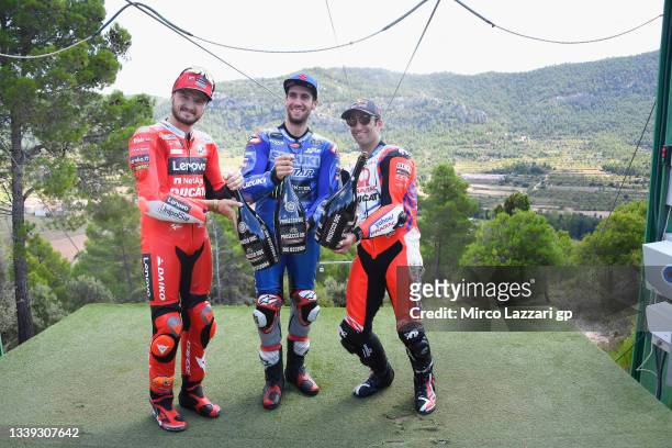 Jack Miller of Australia and Ducati Lenovo Team, Alex Rins of Spain and Team Suzuki ECSTAR and Johann Zarco of France and Pramac Racing celebrate at...