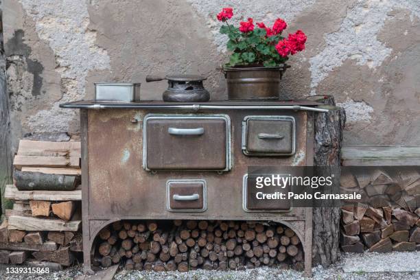old wood burning stove - stew pot stock pictures, royalty-free photos & images