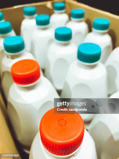 plastic bottles in a cardboard box - ammonia container stock pictures, royalty-free photos & images