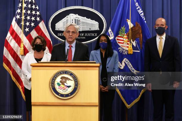 Attorney General Merrick Garland speaks as Deputy Attorney General Lisa Monaco , Associate Attorney General Vanita Gupta and Deputy Assistant...