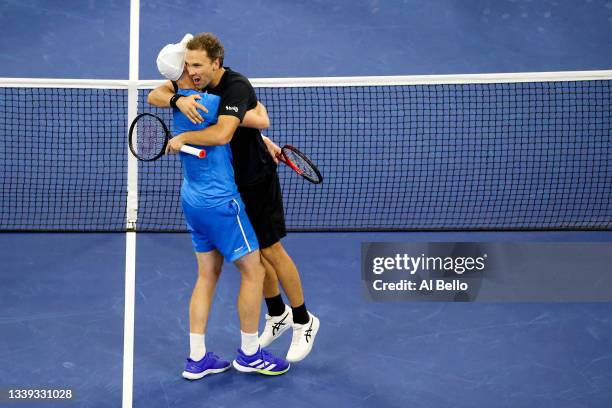 Bruno Soares of Brazil and Jamie Murray of Great Britain celebrate defeating Filip Polasek of Slovakia and John Peers of Australia during their Men’s...