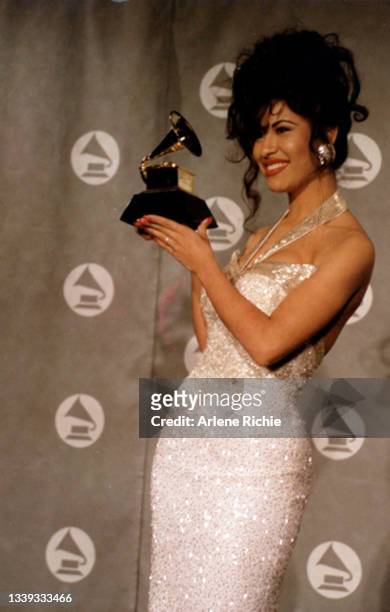 American singer Selena poses with her award for Best Mexican/American Album at the 36th Annual Grammy Awards at Radio City Music Hall, New York, New...