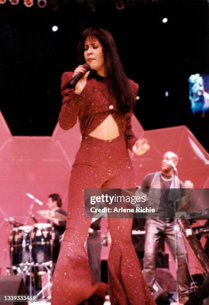 American singer Selena performs onstage during the Houston Livestock Show & Rodeo at the Houston Astrodome, Houston, Texas, February 26, 1995. The...