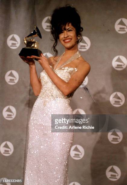American singer Selena poses with her award for Best Mexican/American Album at the 36th Annual Grammy Awards at Radio City Music Hall, New York, New...