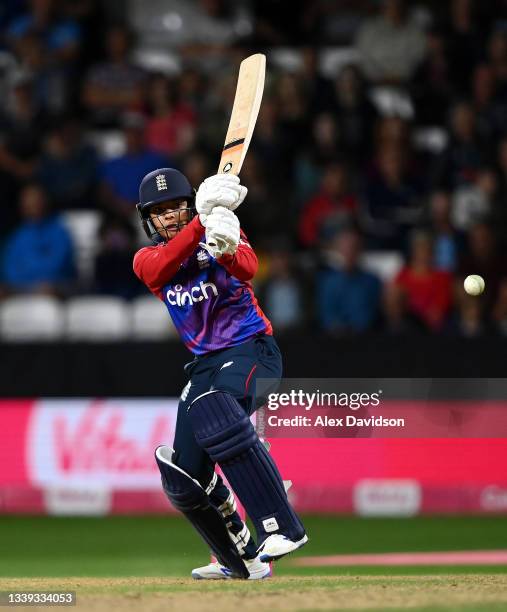 Sophia Dunkley of England hits runs during the 3rd International T20 match between England and New Zealand at The Cooper Associates County Ground on...