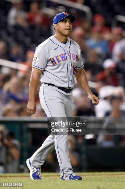 Manager Luis Rojas of the New York Mets walks across the field during the game against the Washington Nationals at Nationals Park on September 03,...
