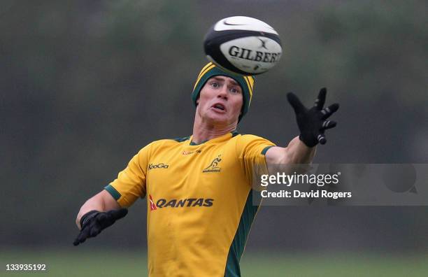 Berrick Barnes catches the ball during the Australia training session at Latymer School on November 22, 2011 in Hammersmith, England.