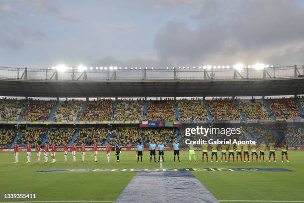 Players of Chile and Colombia line up during the national anthem prior a match between Colombia and Chile as part of South American Qualifiers for...