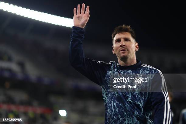 Lionel Messi of Argentina greets fans before a match between Argentina and Bolivia as part of South American Qualifiers for Qatar 2022 at Estadio...