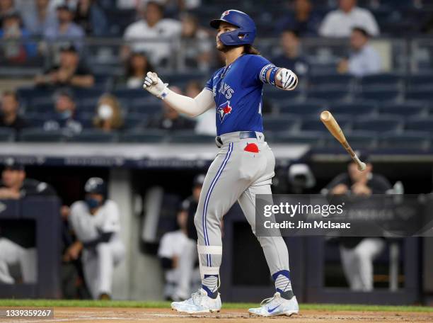 Bo Bichette of the Toronto Blue Jays follows through on his first-inning home run against the New York Yankees at Yankee Stadium on September 09,...