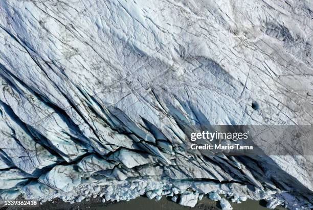 An aerial view of the terminus of the retreating Russell Glacier on September 09, 2021 near Kangerlussuaq, Greenland. 2021 will mark one of the...