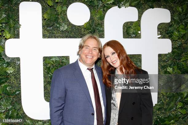 Stephen Chbosky and Julianne Moore attend the "Dear Evan Hansen" Premiere during the 2021 Toronto International Film Festival at Roy Thomson Hall on...