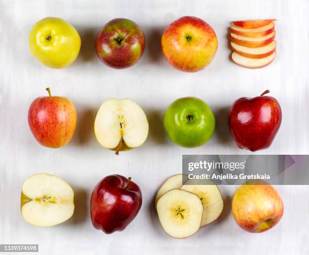 various fresh apples in different colors. - cutting green apple stock pictures, royalty-free photos & images