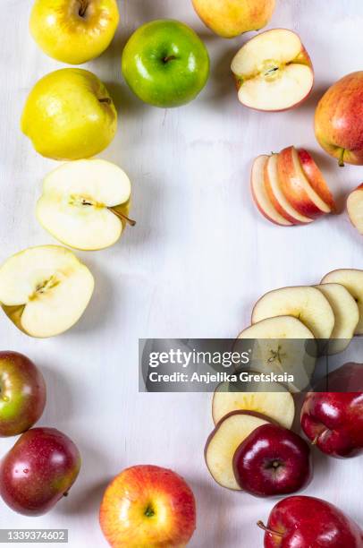 various fresh apples in different colors. - cutting green apple stock pictures, royalty-free photos & images