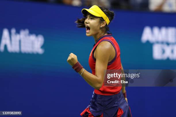 Emma Raducanu of Great Britain celebrates a game win in the second set against Maria Sakkari of Greece during their Women’s Singles semifinals match...