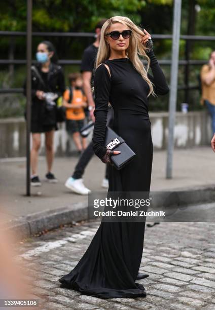 Paris Hilton seen wearing a Monse dresses outside the Monse show during New York Fashion Week S/S 22 on September 09, 2021 in New York City.